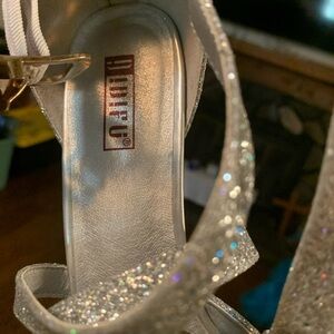 Beautiful silver high heel shoes